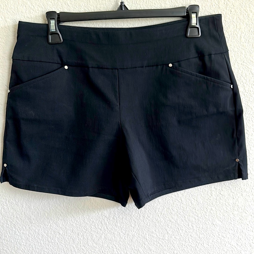 INC mid rise shorts.
